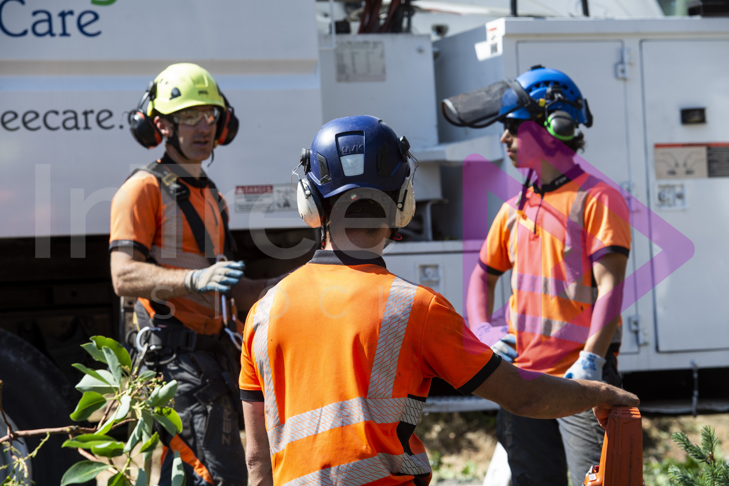 Men wearing hi-viz and protective equipment