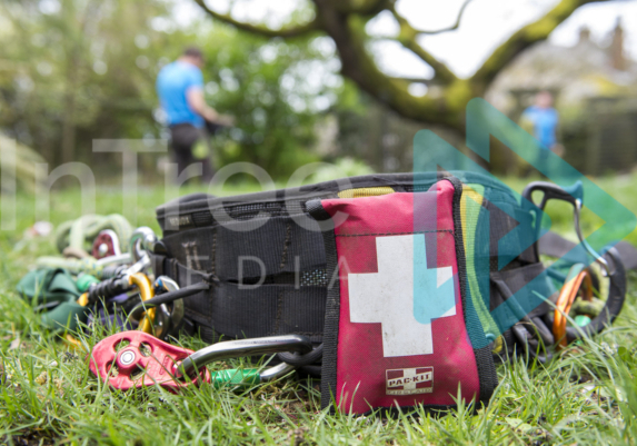 Petzl harness with blood stopper kit on the ground at the end of the day