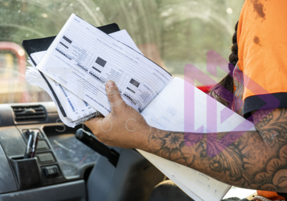 Vehicle inspection report form held in female's hand Vehicle inspection report form held in female's hand