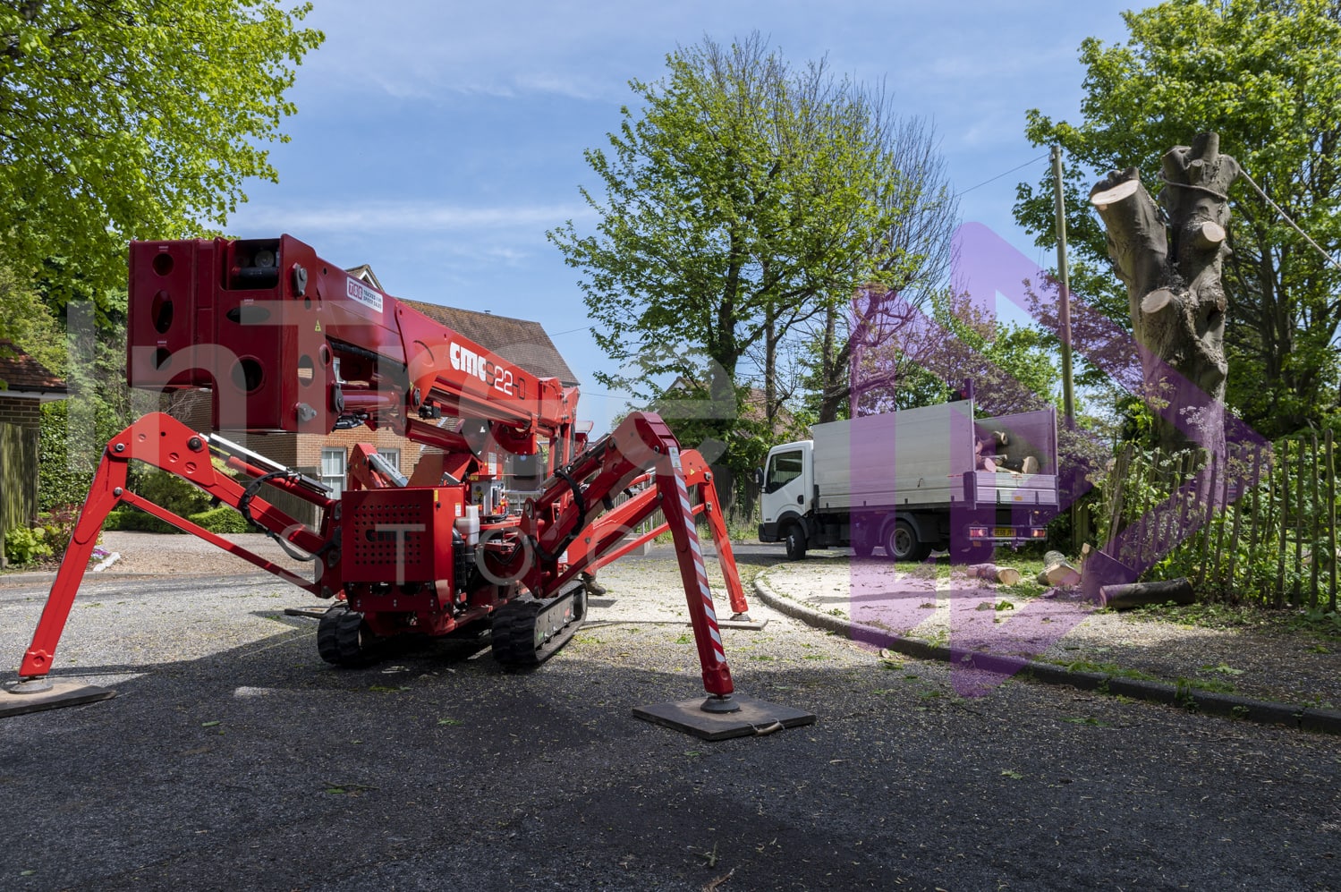 Mobile elevated work platform packed away after removing a sycamore tree