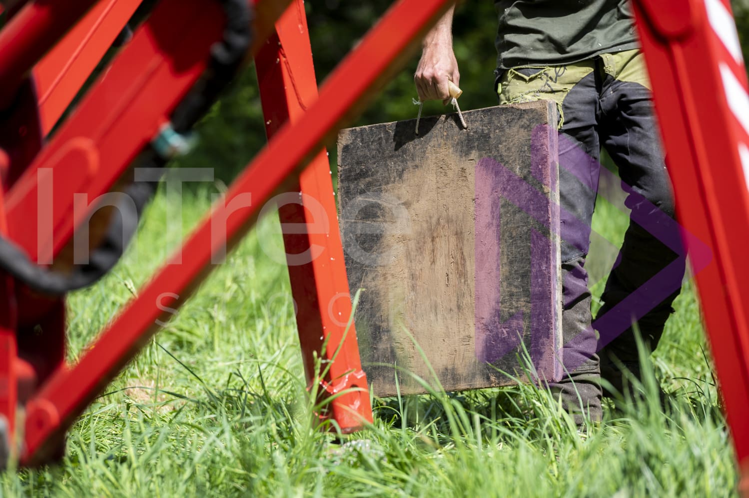 Outrigger pad in ground persons hand
